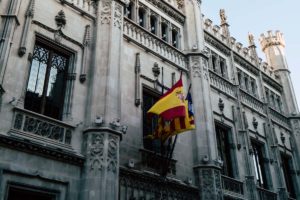 spanish flag over a government office.